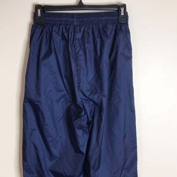 Vintage Nike dark blue windbreaker pants with swoosh on front leg size M 8-10 - Picture 9 of 12
